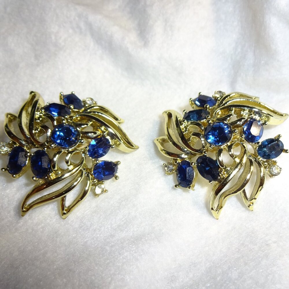 Pair of Vintage Volupte Clip On Earrings Blue Clear Rhinestones Gold Tone Marked